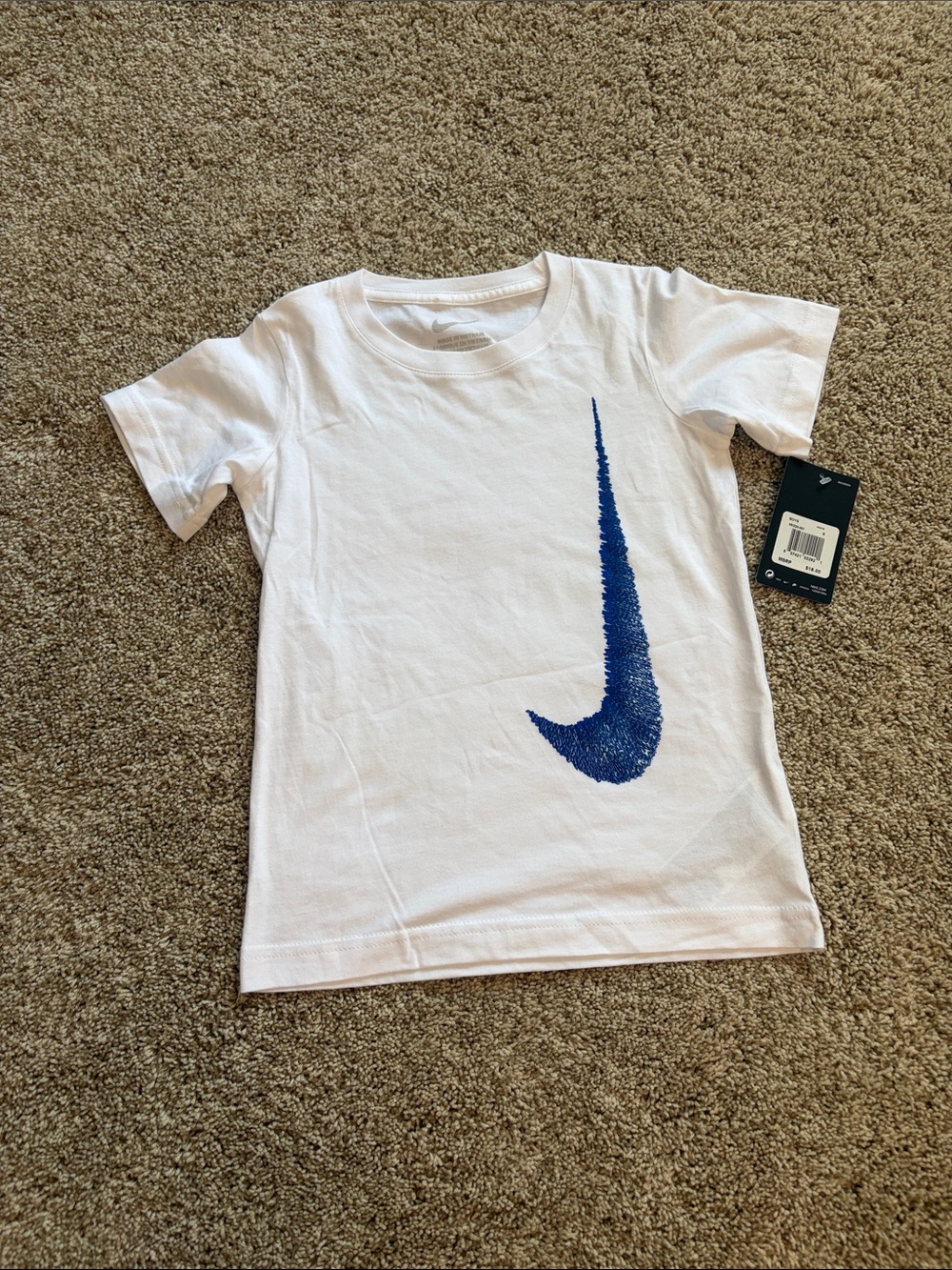 Nike White Short-Sleeve Kids Tee with Blue Swoosh